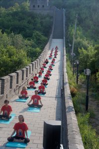 Yoga enthusiasts participate in a mass yoga session at Great Wall of China in Beijing, a day ahead of the International Yoga Day on June 20, 2017.