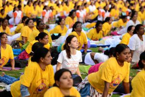 Yoga enthusiasts take part in a mass yoga session on International Yoga Day at the Shree Kanteerava Stadium in Bangalore on June 21.