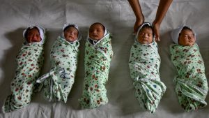 A nurse keeps the newborn children at Wadia hospital at Parel on World Population Day on Tuesday. The day, celebrated on July 11, seeks to focus attention on the urgency and importance of population issues.