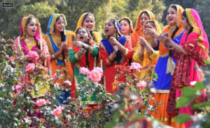 Schoolchildren perform giddha at the 51st Rose Festival in Chandigarh on 17/02/2023