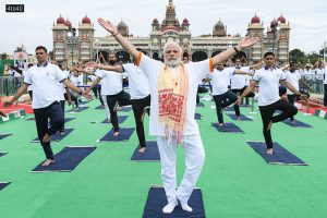 PM Modi takes part in mass yoga demonstration at Mysuru Palace Ground july 21, 2022