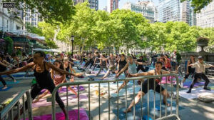 Another look at the yoga session at Bryant Park New York near the famous New York Public Library