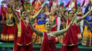 Artists performs during an inauguration of Navratri or nine night festival in Ahmedabad