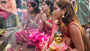 Devotees perform ritual during Chhath Puja, in Kolkata